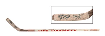 Hockey - 1990's Theo Fleury Game Used Autographed Louisville Stick