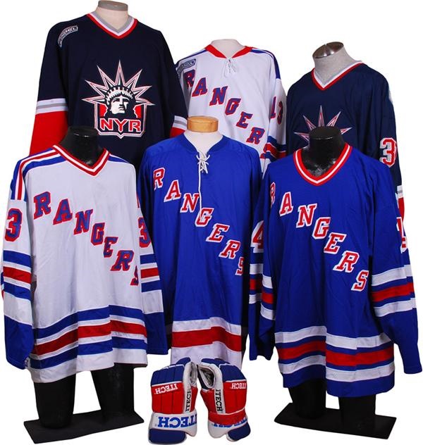 - Collection of Six New York Rangers Game Worn Jerseys and One 
Pair of Gloves