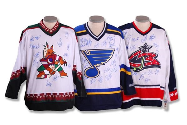 Hockey Autographs - Hockey Team Signed Jerseys (3)