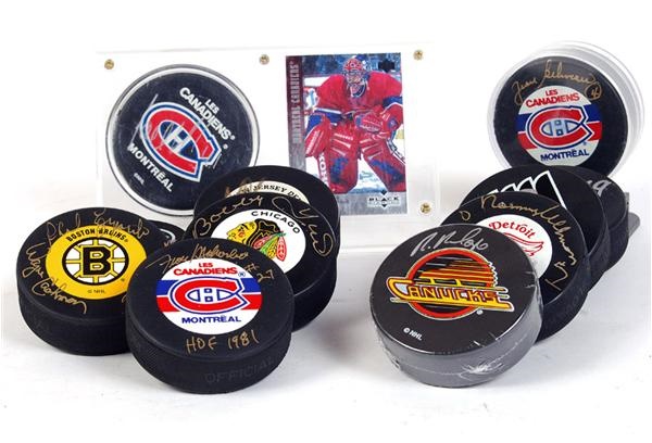 Hockey Autographs - Collection of Signed Hockey Pucks with Hall of Famers including Esposito, Brodeur, Hull, & Beliveau (11)