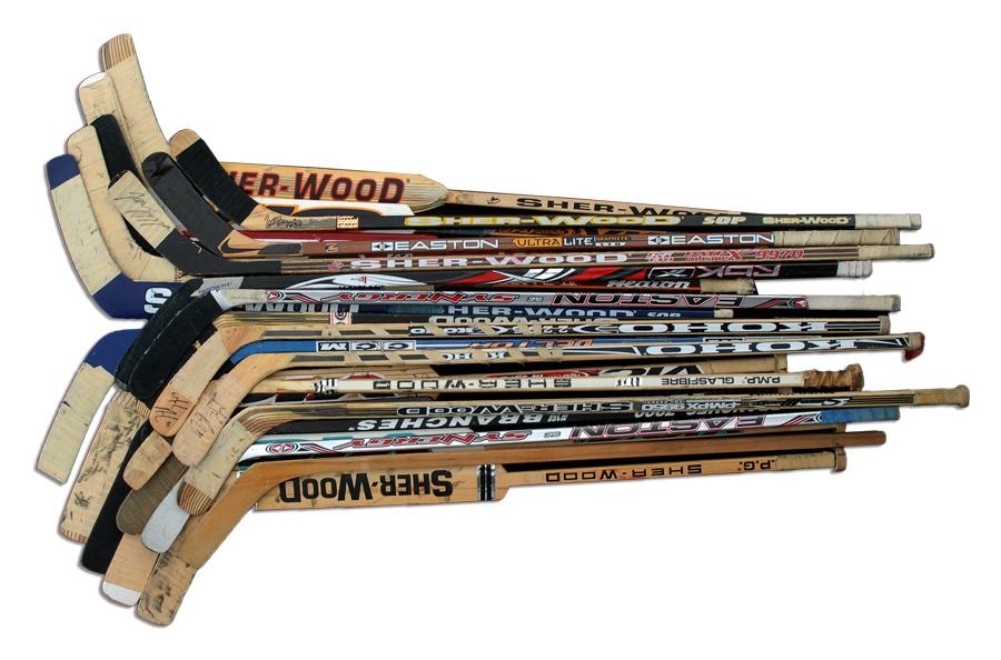 Hockey - Collection of Game Used Hockey Sticks (21)