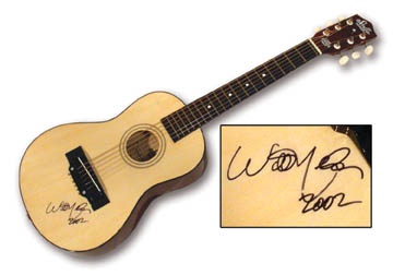 - Willie Nelson Autographed Guitar