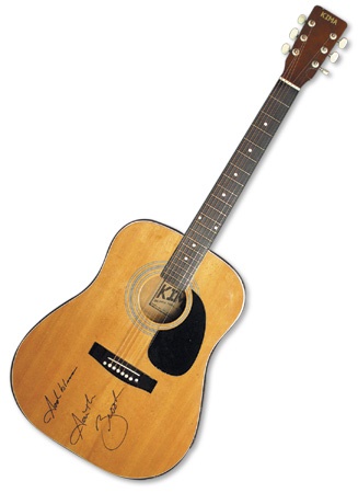 - Garth Brooks Signed Acoustic Guitar