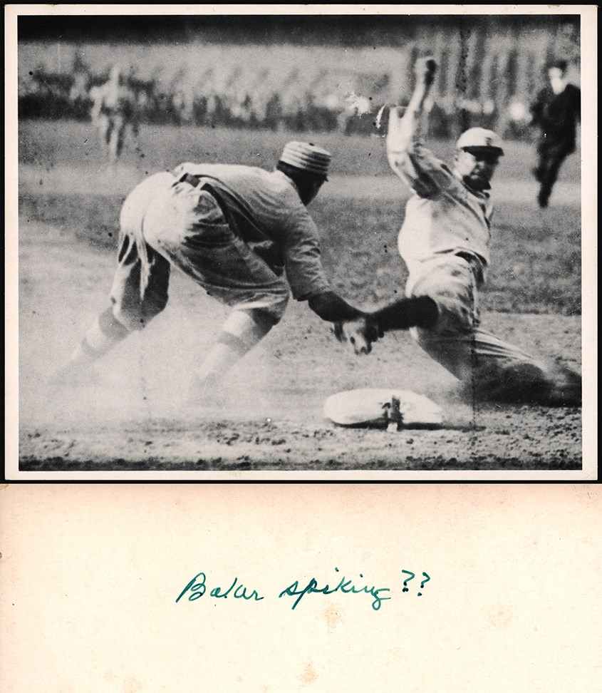 Baseball Autographs - Ty Cobb "Spiking" Frank Baker Photograph with Cobb's Writing on the Back (PSA)