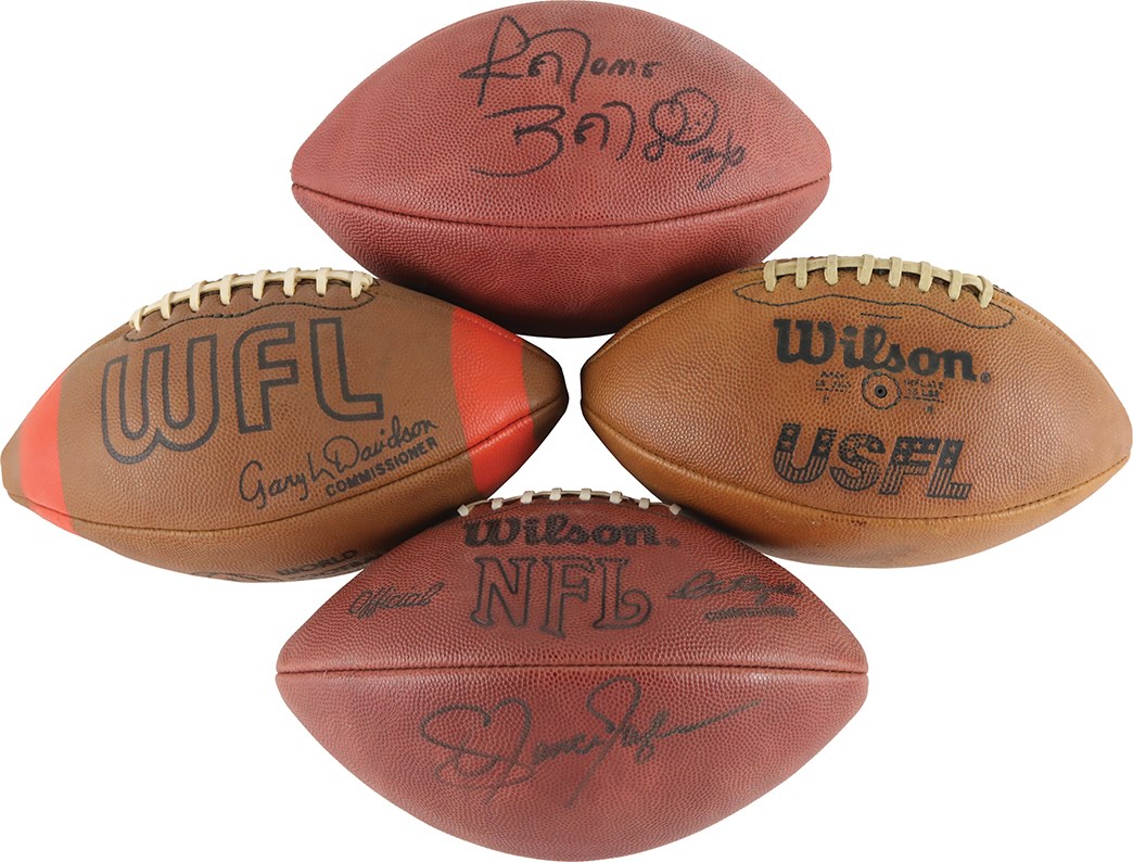 Four (4) Footballs - One Signed By Lawrence Taylor