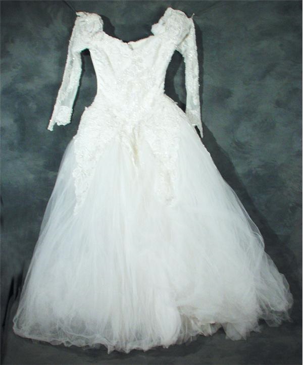 - Raquel Welch "Torch Song" Wedding Gown