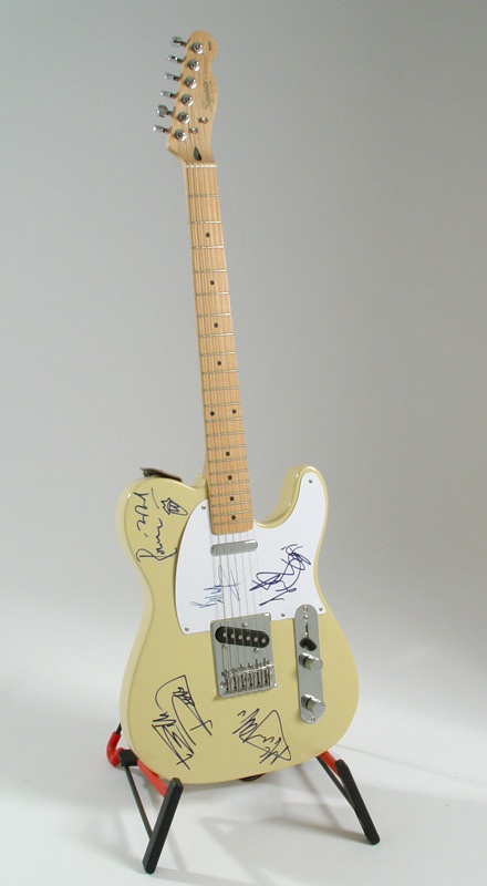 - The Rolling Stones Signed Guitar