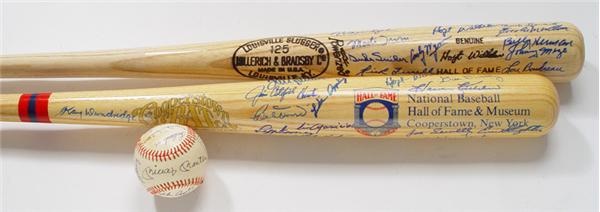- Hall of Fame Signed Baseball and Bats (3).