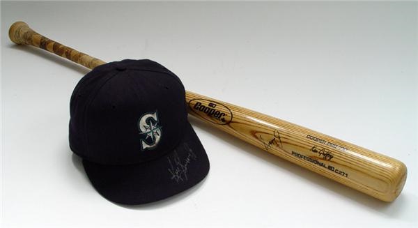 - Ken Griffey Jr. Autographed Game Used Rookie Bat and 1994 Cap