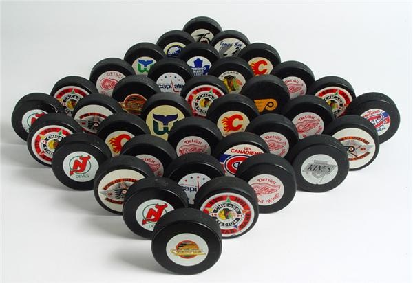 - Massive Collection of NHL Game Pucks (292)