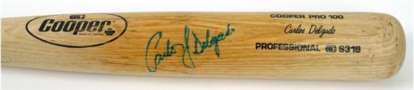 - Carlos Delgado Autographed Game Used Bat (35")
