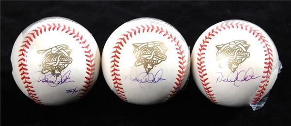 - Collection of (3) Derek Jeter Signed 2000 Wold Series Baseballs