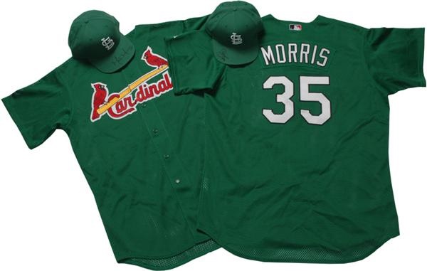 - Game-Issued  Reggie Sanders Cardinals  “St. Patrick’s Day” Green  Jersey and Signed Cap from 3/17/05