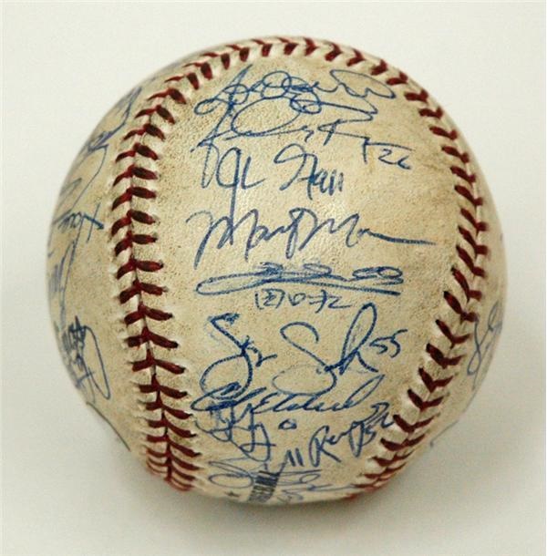 - Opening Day 2005  “Team Signed” Game Used Baseball