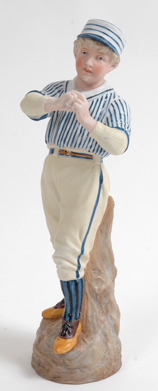 - Heubach 19th Century German Bisque 
Porcelain Baseball Figurine (12.5”)