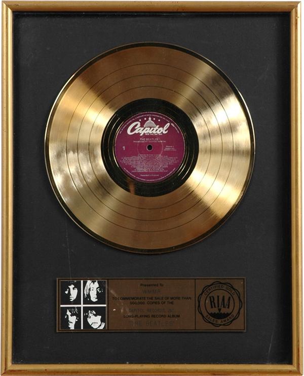 - The Beatles “White Album” Gold Record Award