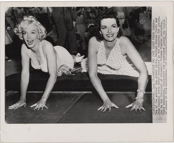 - Marilyn Monroe and Jane Russell at Graumann’s (1953)