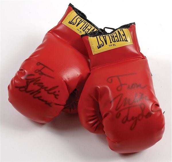 - Mike Tyson Boxing Gloves signed to Charlie Sheen