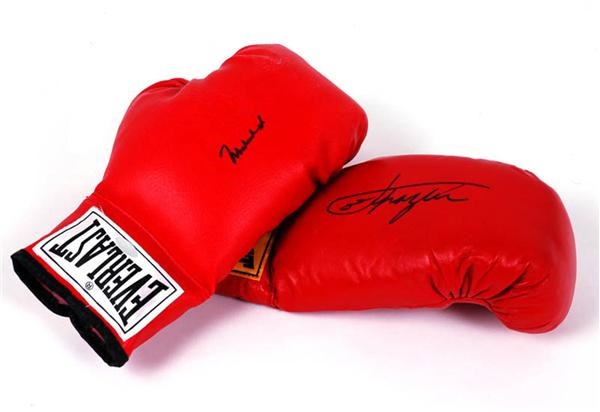 - Muhammad Ali & Joe Frazier Signed Boxing Glove Lot.