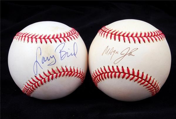 - Larry Bird and Magic Johnson Single Signed Baseballs