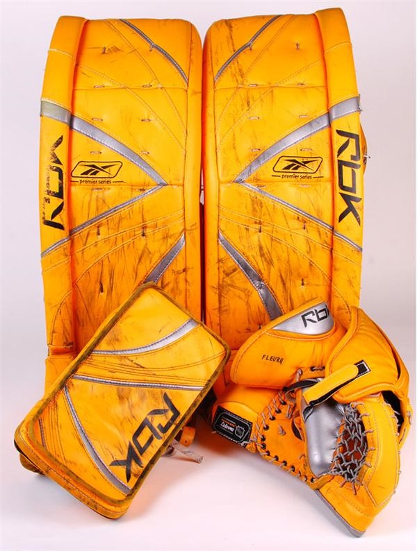 - 2005-06 Marc Andre Fleury Pittsburgh Penguins Photo-Matched 
Game Worn Trapper, Blocker and Leg Pads