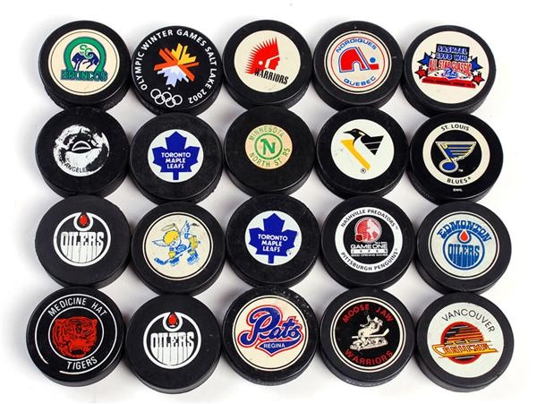 - Collection of Hockey Pucks with WHA, NHL and WHL (20)
