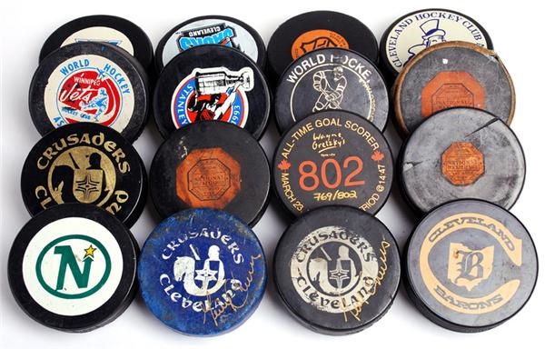 Lot of Hockey Pucks with Game Used and Signed Pieces (46)