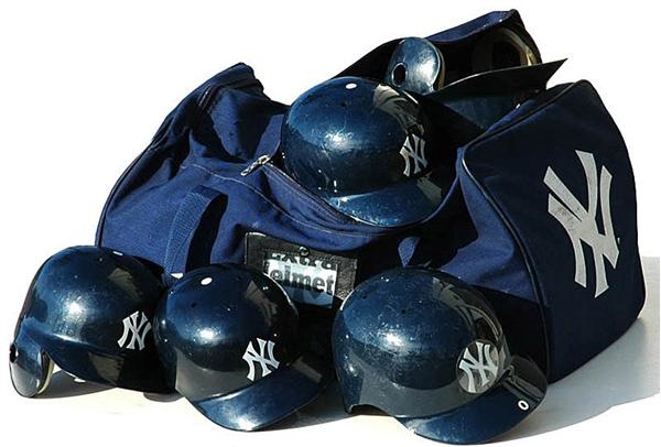 Baseball Equipment - New York Yankees Equipment Bag with Four Game Used Helmets