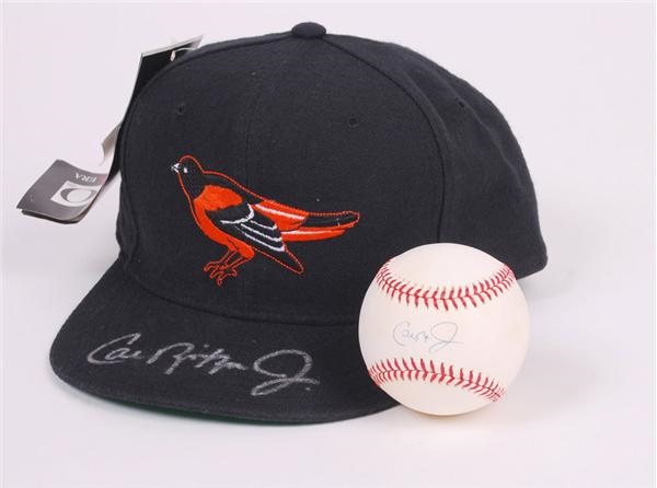 Baseball Autographs - Cal Ripken Jr. Signed Hat and Baseball (2)