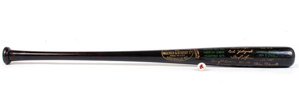 - 1975 Boston Red Sox Black Bat and 1975 World Series Press Pin (2)