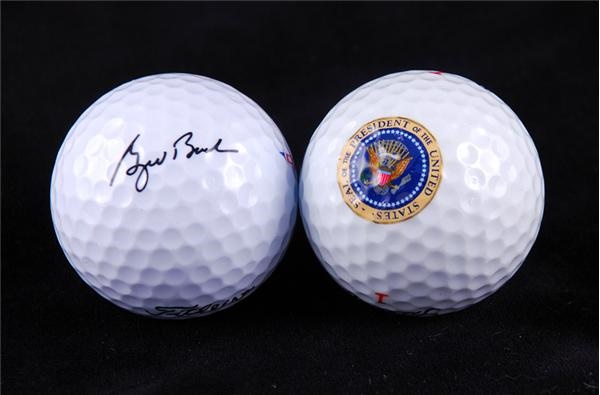- George Bush (Father & Son) Facsimile Signed Presentation Golf Balls (2)