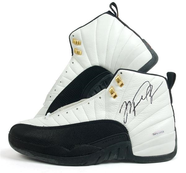 - Michael Jordan Signed Air Jordan Shoes (UDA)