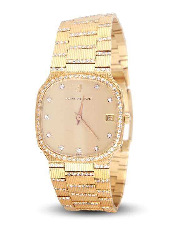 - Audemars Piguet 18k Gold and Diamond Encrusted Wristwatch