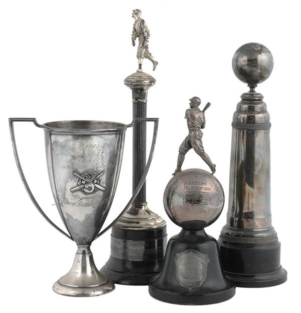 - Four Vintage Baseball Trophies