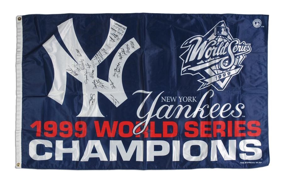 NY Yankees, Giants & Mets - 1999 New York Yankees Signed Flag (27+ signatures)
