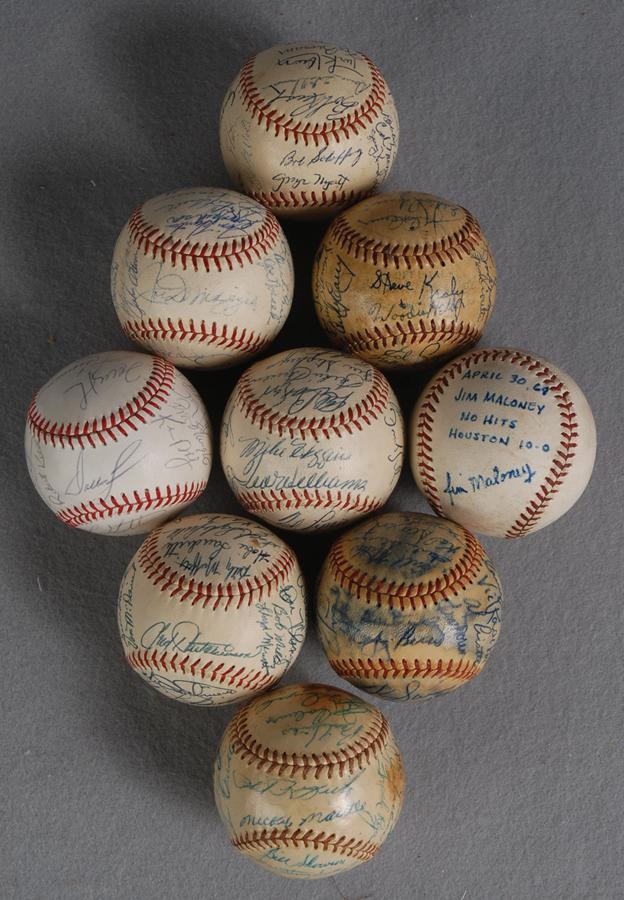 The Yankee Fan Collection - Collection of 9 Team Signed Baseballs including 4 New York Yankees Baseballs