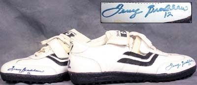- Terry Bradshaw Game Worn White Spalding Shoes
