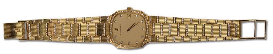 - Audemars Piguet 18k Gold and Diamond Encrusted Wristwatch