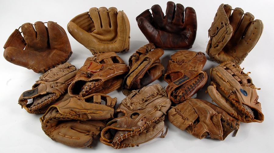 - Collection of 12 Store Gloves Including DiMaggio and Mantle