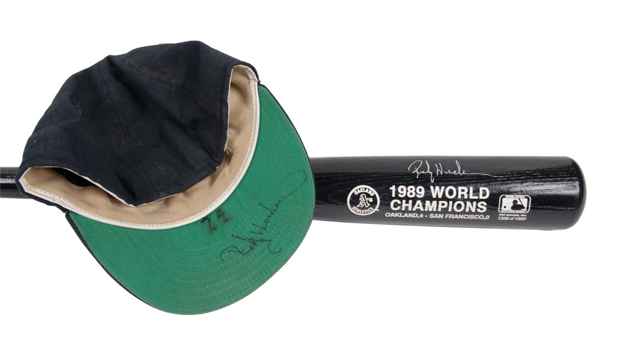 Baseball Equipment - Rickey Henderson Game Worn Hat and Signed Bat