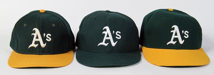 Large Collection of Kansas City A's/Royals and Oakland A's Caps (16)
