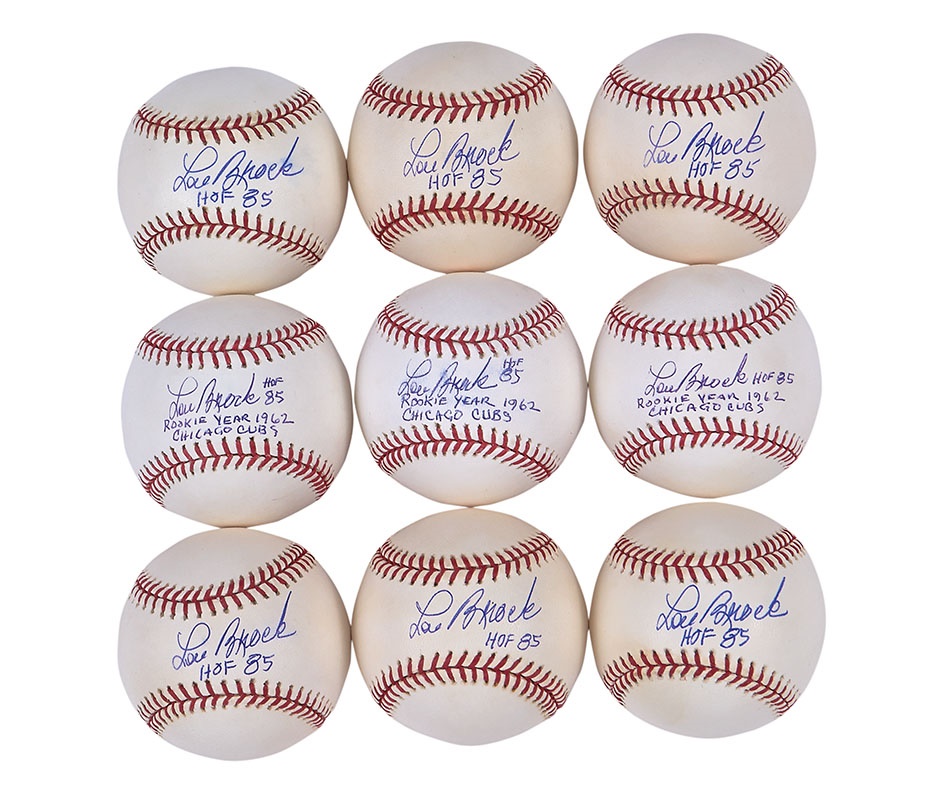 Property from the Collection of Lou Brock - Two Dozen Lou Brock Single-Signed Baseballs with Notations
