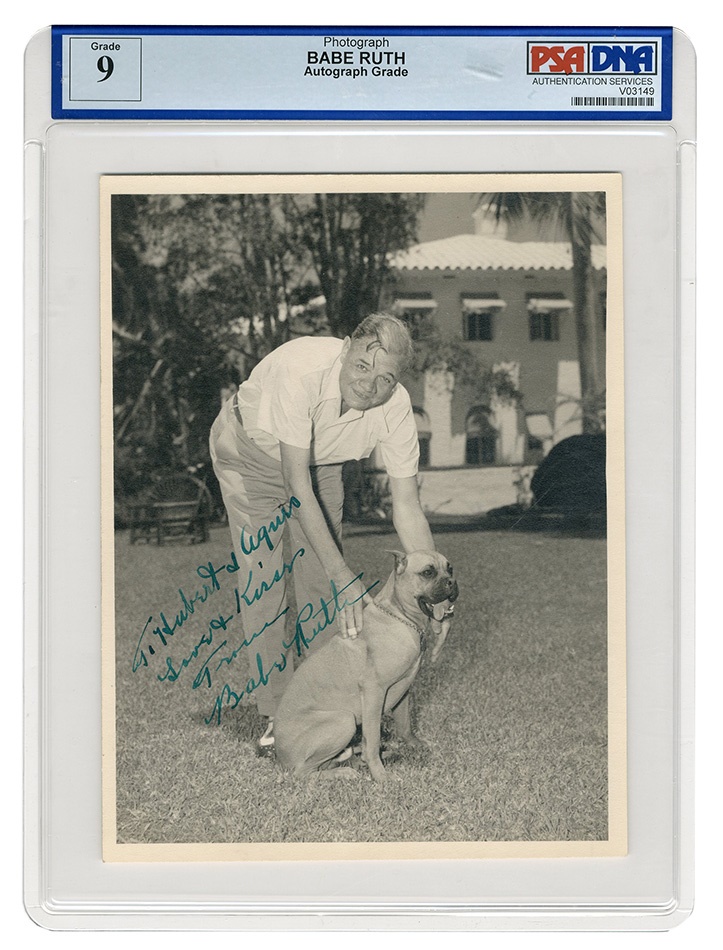 Ruth and Gehrig - Babe Ruth Petting Dog Signed Photograph (PSA/DNA Mint 9)