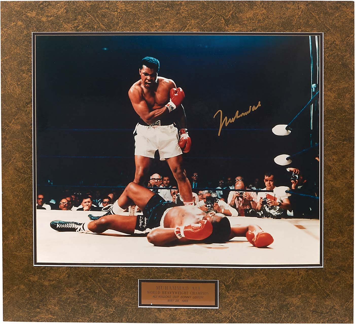 Muhammad Ali & Boxing - Muhammad Ali Signed Iconic Photo Standing Over Sonny Liston PSA/DNA Graded: 10