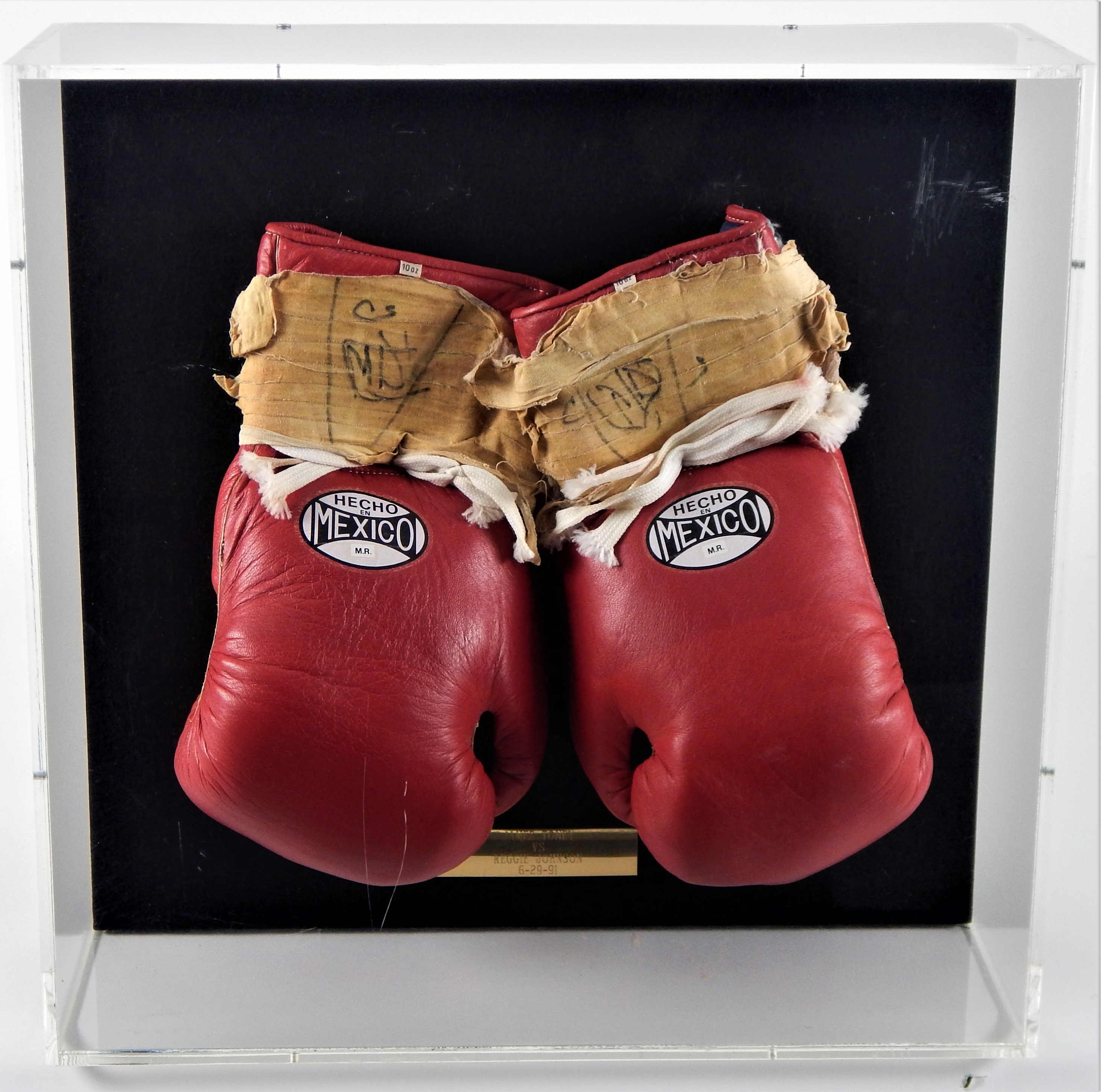 - James Toney Fight Worn Gloves vs. Reggie Johnson