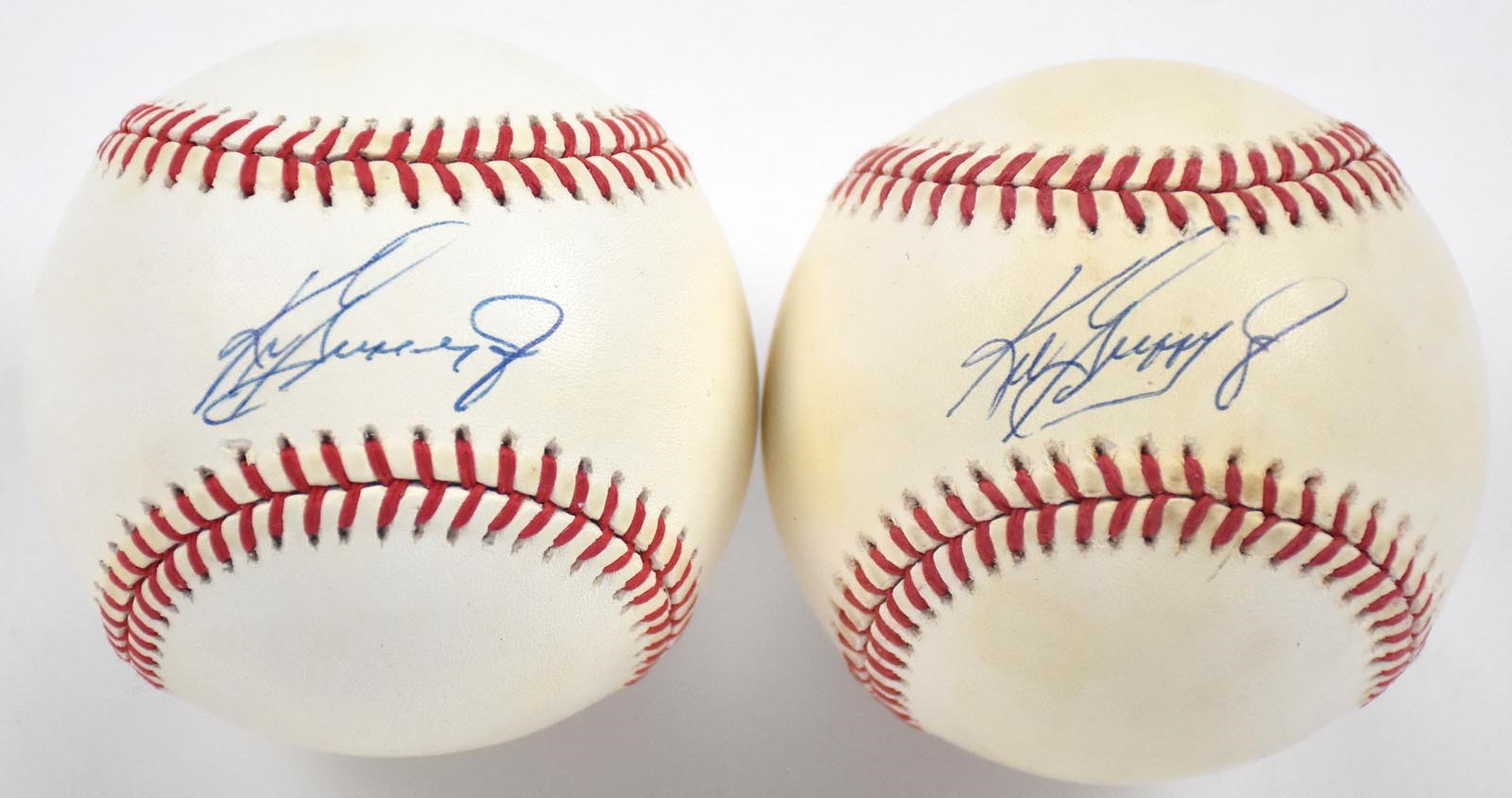 Baseball Autographs - Pair of Ken Griffey Jr. Single Signed Baseballs