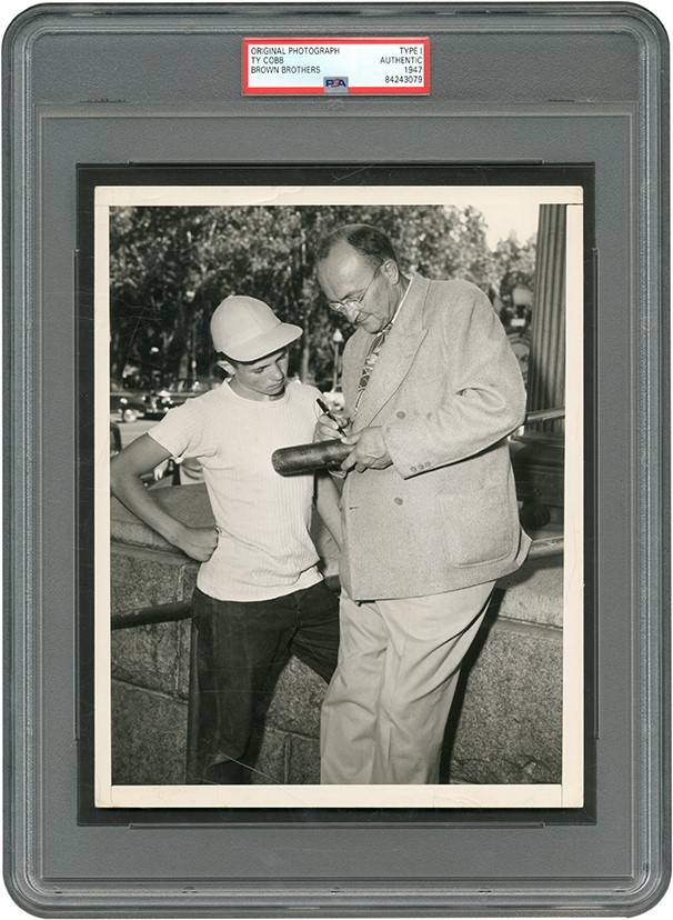 Ty Cobb Signs a Bat Photograph (PSA Type I)