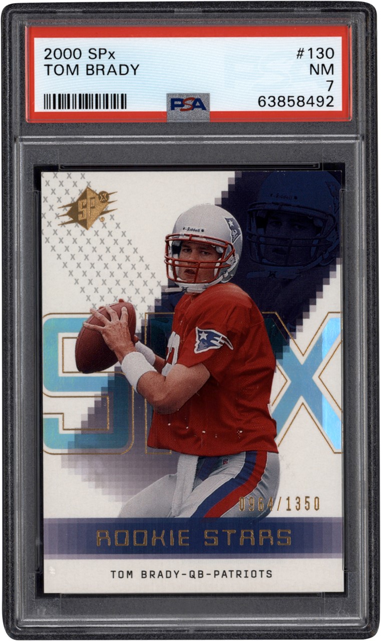 - 000 SPX #130 Tom Brady Rookie 0964/1350 PSA NM 7