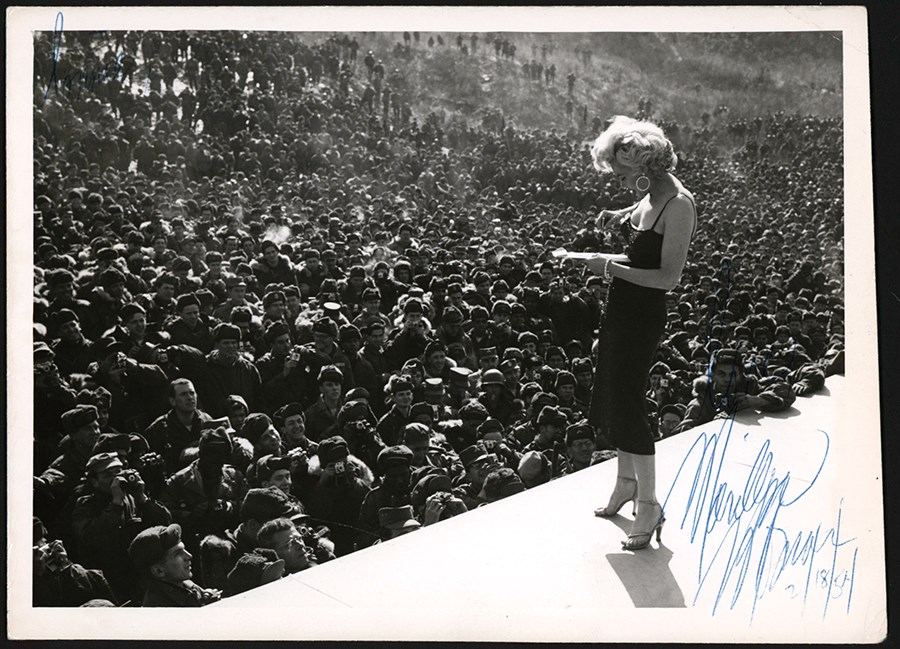 - 1954 Marilyn Monroe on Stage with the USO Tour Photograph - Secretarially Signed (PSA Type I)