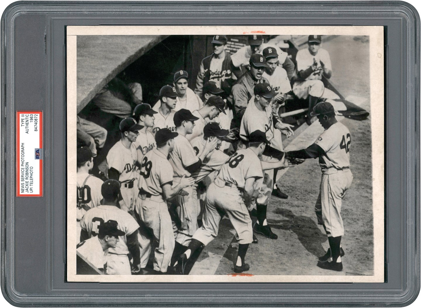 - 1951 Jackie Robinson Greeted by Teammates Photograph (PSA Type III)